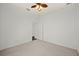 Bedroom featuring a ceiling fan at 24576 Buckingham Way, Punta Gorda, FL 33980