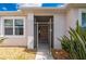 Home's entrance featuring a screen door and a view of the interior at 24576 Buckingham Way, Punta Gorda, FL 33980