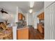 Spacious kitchen with a breakfast bar and a view into the living room at 24576 Buckingham Way, Punta Gorda, FL 33980