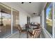 Spacious screened lanai featuring comfortable seating and tranquil views at 24576 Buckingham Way, Punta Gorda, FL 33980