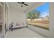 Relaxing screened lanai with comfortable seating overlooking the water at 24576 Buckingham Way, Punta Gorda, FL 33980