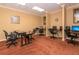 Office area with multiple computers and desks, ideal for working from home at 24576 Buckingham Way, Punta Gorda, FL 33980