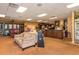 Well-stocked pro shop with seating area and checkout counter, a golfer's delight at 24576 Buckingham Way, Punta Gorda, FL 33980