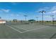 Tennis courts for community residents with shady benches and lighting for nighttime play at 24576 Buckingham Way, Punta Gorda, FL 33980