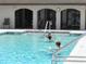 Enjoy the Florida lifestyle in this community pool on a sunny day at 25100 Sandhill Blvd # J-201, Punta Gorda, FL 33983