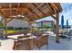 The community pavilion boasts seating, tables, and a ceiling fan for a comfortable outdoor gathering space at 25100 Sandhill Blvd # J-201, Punta Gorda, FL 33983