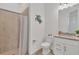 Bathroom featuring a shower, toilet, and vanity with granite countertop at 25186 Keygrass Ct, Punta Gorda, FL 33955