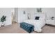 Cozy bedroom with plenty of lighting and a comfy bed at 25186 Keygrass Ct, Punta Gorda, FL 33955