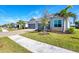 Charming one-story home with a two-car garage, and well-maintained landscaping at 25186 Keygrass Ct, Punta Gorda, FL 33955