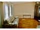 Cozy living room featuring wood floors and natural light at 258 Palm Harbor Dr, North Port, FL 34287