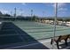 Several shuffleboard courts with shaded seating areas offering a social recreation space at 258 Palm Harbor Dr, North Port, FL 34287