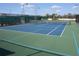 Well-maintained tennis court offering a great space for recreation and exercise at 258 Palm Harbor Dr, North Port, FL 34287