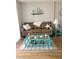 Charming living room with coastal decor, comfortable seating, and stylish accents at 3006 Caring Way # 409, Port Charlotte, FL 33952