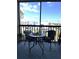 Screened in lanai features a table and chairs with relaxing outdoor views at 3006 Caring Way # 409, Port Charlotte, FL 33952