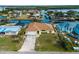 Aerial view of house, canal and neighborhood at 3370 Dover Dr, Punta Gorda, FL 33983
