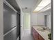Bathroom with a shower/tub combo and a double sink vanity at 3370 Dover Dr, Punta Gorda, FL 33983