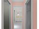 Bathroom with double vanity and access to closets at 3370 Dover Dr, Punta Gorda, FL 33983