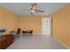 Bright bedroom with tiled floors and access to other rooms at 3370 Dover Dr, Punta Gorda, FL 33983
