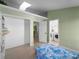 Cozy bedroom with tiled floors and built-in shelving at 3370 Dover Dr, Punta Gorda, FL 33983