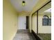 Bright entryway with tiled floor and screened porch at 3370 Dover Dr, Punta Gorda, FL 33983