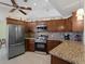 Modern kitchen featuring granite countertops and stainless steel appliances at 3370 Dover Dr, Punta Gorda, FL 33983