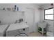 Laundry room with washer, dryer, sink and toilet at 3370 Dover Dr, Punta Gorda, FL 33983