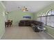 Spacious living room featuring a sectional sofa and a dining area at 3370 Dover Dr, Punta Gorda, FL 33983