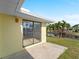 Private patio with sliding glass doors and canal view at 3370 Dover Dr, Punta Gorda, FL 33983