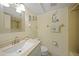 Bathroom features a vanity sink and a tiled shower/bath at 367 Coldeway Dr # H10, Punta Gorda, FL 33950