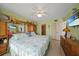 Brightly lit bedroom boasts ample storage, ensuite bathroom and a sunny decor at 367 Coldeway Dr # H10, Punta Gorda, FL 33950