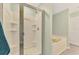 Bathroom featuring a modern stand-up shower and a soaking tub at 3867 Winer Rd, North Port, FL 34288