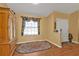 Entryway featuring a charming rug, window, and rustic cabinet at 4175 Horseshoe Ave, North Port, FL 34286