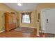 Entryway featuring a charming rug, window, and rustic cabinet at 4175 Horseshoe Ave, North Port, FL 34286