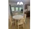 Cozy dining area adjacent to a comfortable living room, perfect for entertaining at 432 Olivia Rd, Venice, FL 34293