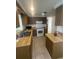 Functional kitchen with ample cabinet space and tile flooring at 432 Olivia Rd, Venice, FL 34293
