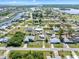 Extensive aerial view of a residential neighborhood near waterfronts and community amenities at 530 Lakemont Nw Ave, Port Charlotte, FL 33952