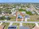 Aerial view of a property with well-maintained landscaping and a defined perimeter at 530 Lakemont Nw Ave, Port Charlotte, FL 33952