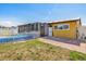 The backyard has a screened in porch, vinyl fence, and inground pool at 530 Lakemont Nw Ave, Port Charlotte, FL 33952