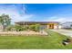 Charming single-story home with solar panels, beautiful landscaping, and a welcoming front yard at 530 Lakemont Nw Ave, Port Charlotte, FL 33952