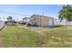 Exterior view of a metal garage with room for parking and storage at 530 Lakemont Nw Ave, Port Charlotte, FL 33952