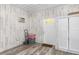 Mud room with tile flooring, lots of wall panelling, and closet storage at 530 Lakemont Nw Ave, Port Charlotte, FL 33952