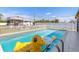 This in-ground pool is surrounded by a vinyl privacy fence, and a shed at 530 Lakemont Nw Ave, Port Charlotte, FL 33952