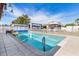This inground pool has tile edges, and a vinyl privacy fence at 530 Lakemont Nw Ave, Port Charlotte, FL 33952