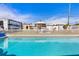 This backyard features an inground pool, with a vinyl privacy fence at 530 Lakemont Nw Ave, Port Charlotte, FL 33952