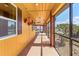 Screened in porch with windows and hanging plants at 530 Lakemont Nw Ave, Port Charlotte, FL 33952