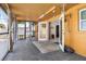 Spacious tiled sun room provides access to the backyard and the home's interior at 530 Lakemont Nw Ave, Port Charlotte, FL 33952