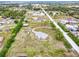 Expansive property with a well-maintained home, storage buildings, and large open spaces, perfect for rural living at 6171 Swiss Blvd, Punta Gorda, FL 33982