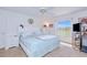 Inviting bedroom with a comfortable bed, bright natural light, and a ceiling fan at 6171 Swiss Blvd, Punta Gorda, FL 33982