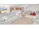 Spacious living room with comfortable seating, open floor plan, and seamless flow to the kitchen at 6171 Swiss Blvd, Punta Gorda, FL 33982