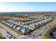 An aerial shot featuring the community's layout with well-kept homes, landscaping, and nearby natural preserves at 6251 Cassia St, Bradenton, FL 34203
